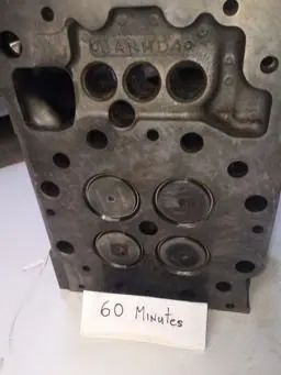 Cat cylinder head combustion face after sixty minutes, bare cast iron