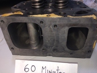 Cat cylinder head ports after sixty minutes, bare cast iron with no carbon
