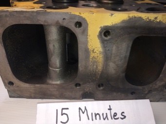 Cat cylinder head ports after fifteen minutes, carbon still lining the bores