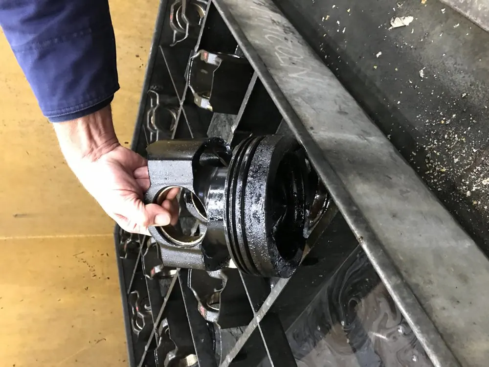Pistons in the soak tray, as they came off the engine.