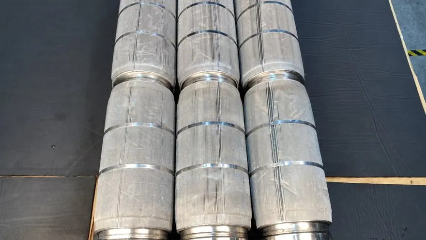 Pleated stainless mesh filter elements cleaned and laid out on the bench