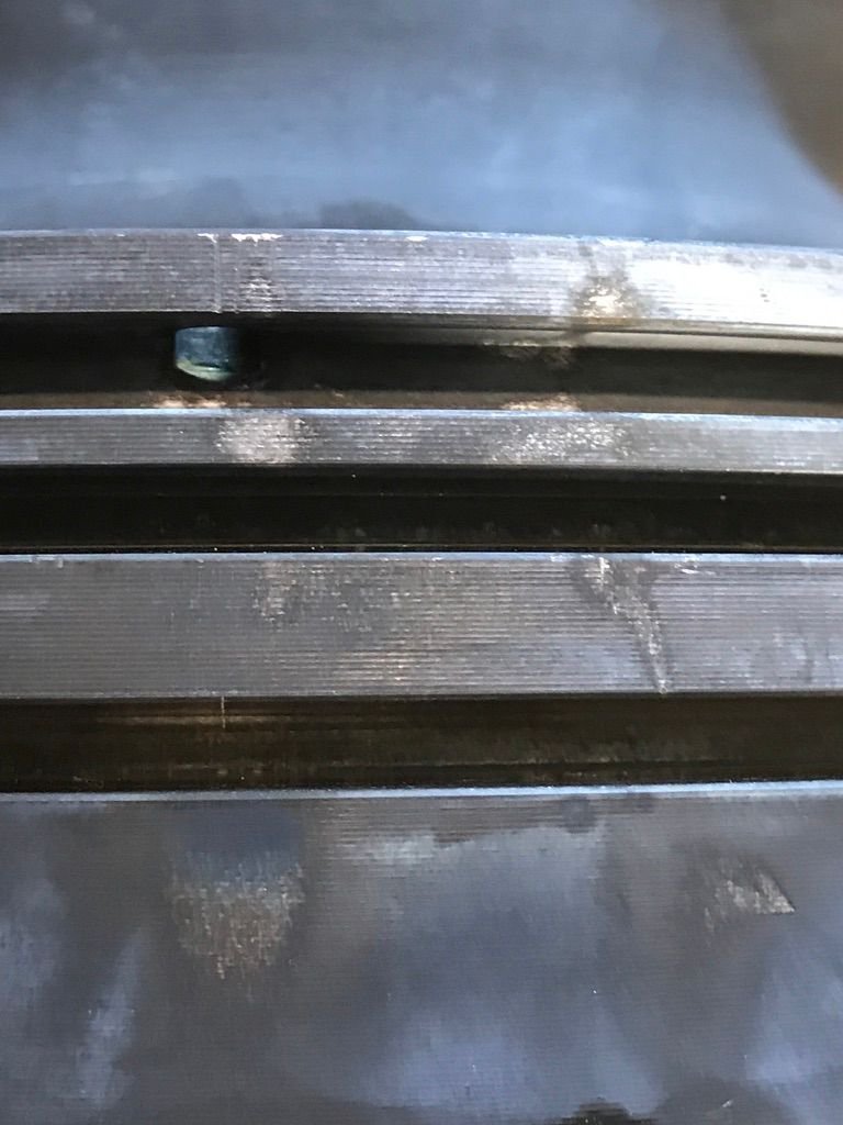 Coked diesel piston — heavy carbon