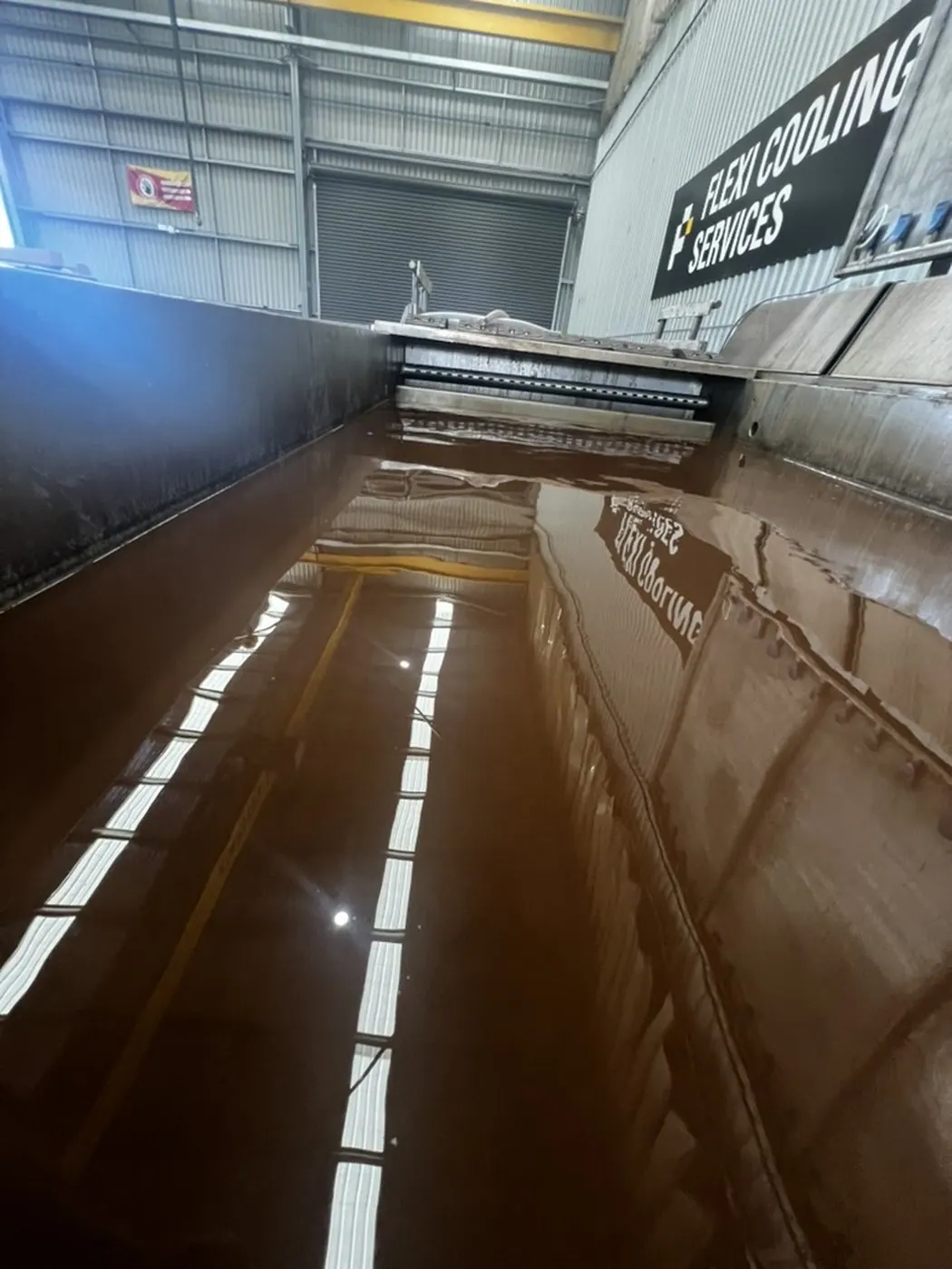 The working bath of an EVS 7000-PL industrial ultrasonic tank at Flexi Cooling Services