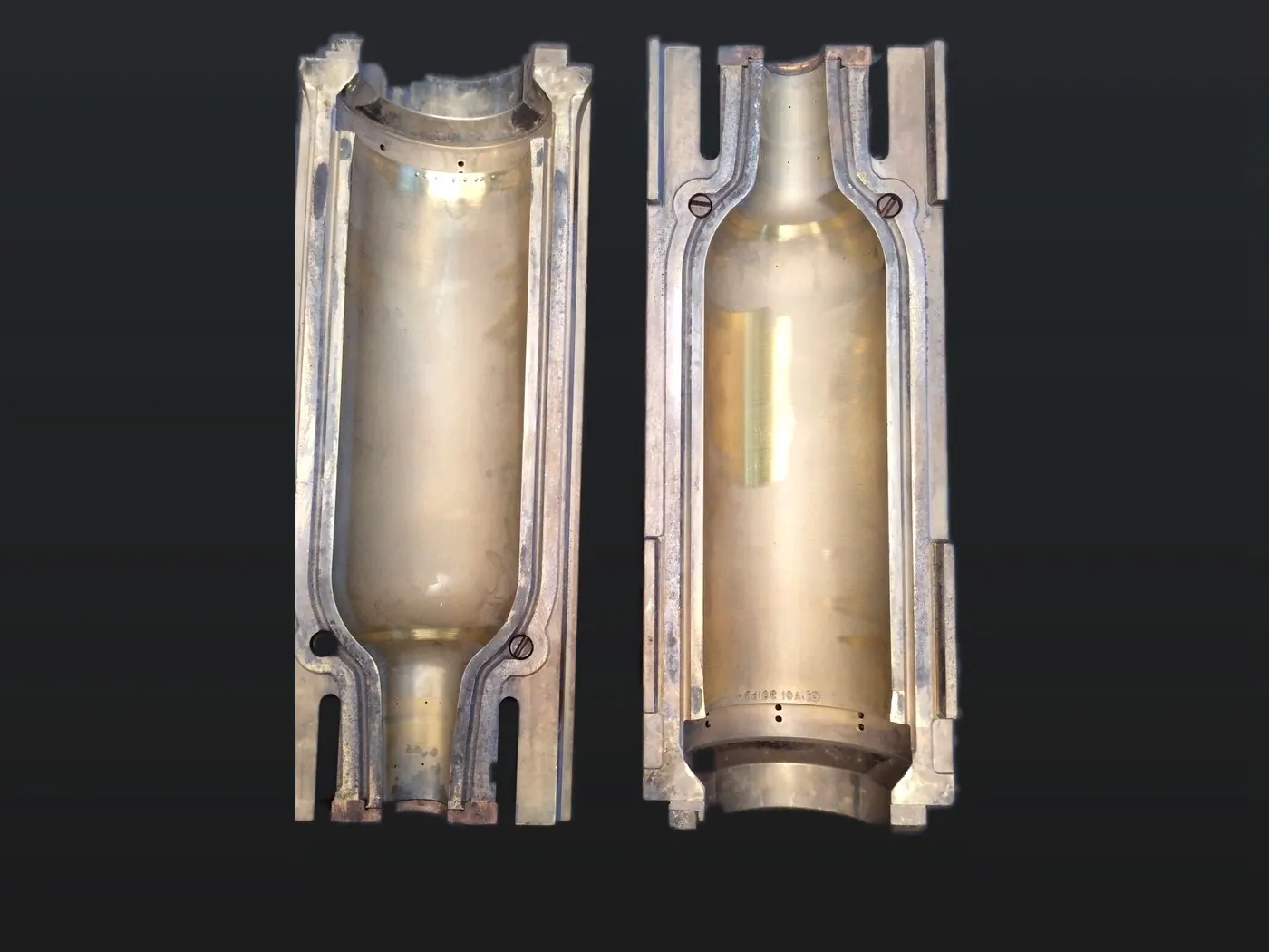 Glass bottle blow-mould halves, cleaned