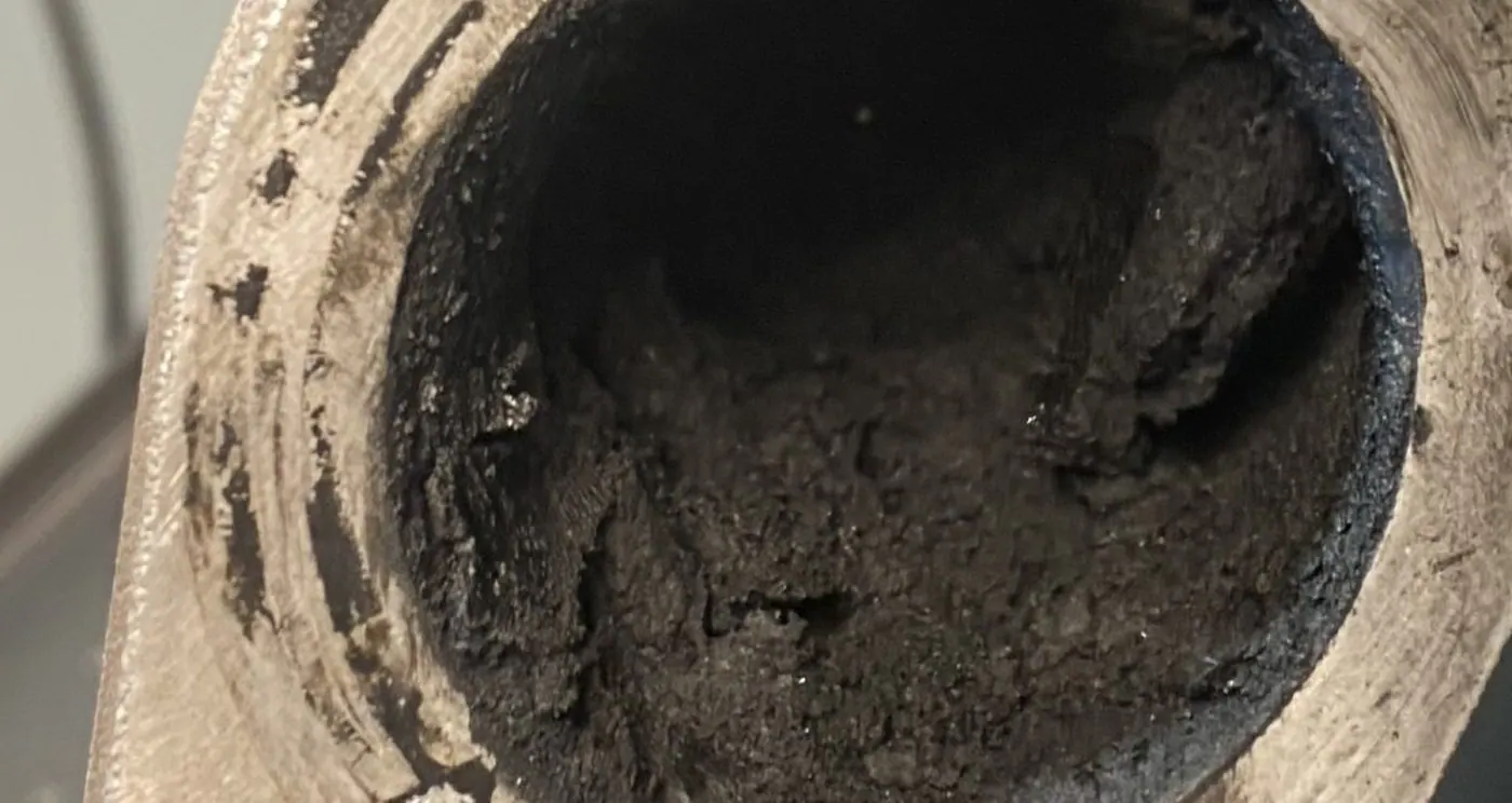 Bore of a part with deposit packed into it