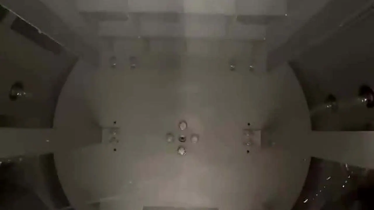 Rinse jets firing inside an UltraWash chamber during pre-despatch testing