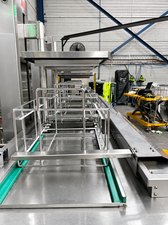 Misonics SonoLine automated ultrasonic cleaning line &mdash; Basket carriers on the transfer rail