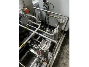 Misonics SonoLine automated ultrasonic cleaning line — Filtration manifold — housing, pump and valves