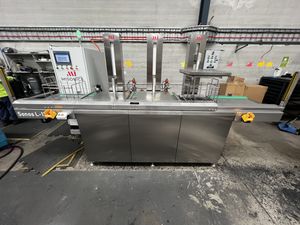 Misonics SonoLine automated ultrasonic cleaning line — Three stations, lift columns raised