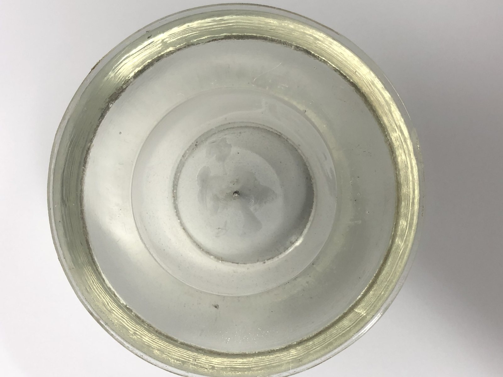 Airfield light lens centre optic before and after ultrasonic cleaning — after the cycle