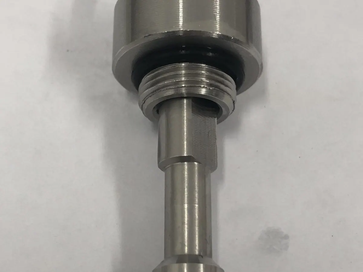 The same nozzle descaled, orifice and swirl chamber clear