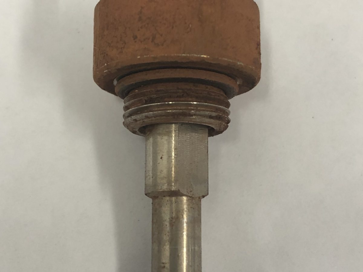 Dust suppression nozzle — before and after ultrasonic cleaning — as received