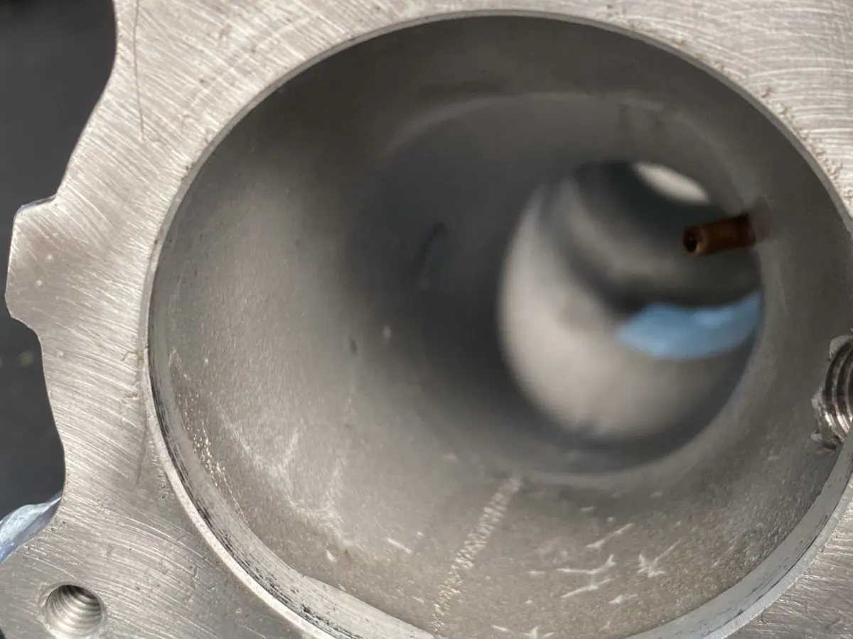 Inlet port bore — before and after ultrasonic cleaning — after the cycle
