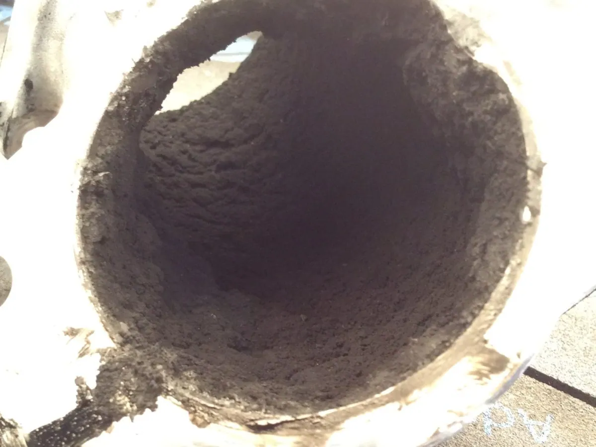Throttle body bore packed with oil-bound carbon.