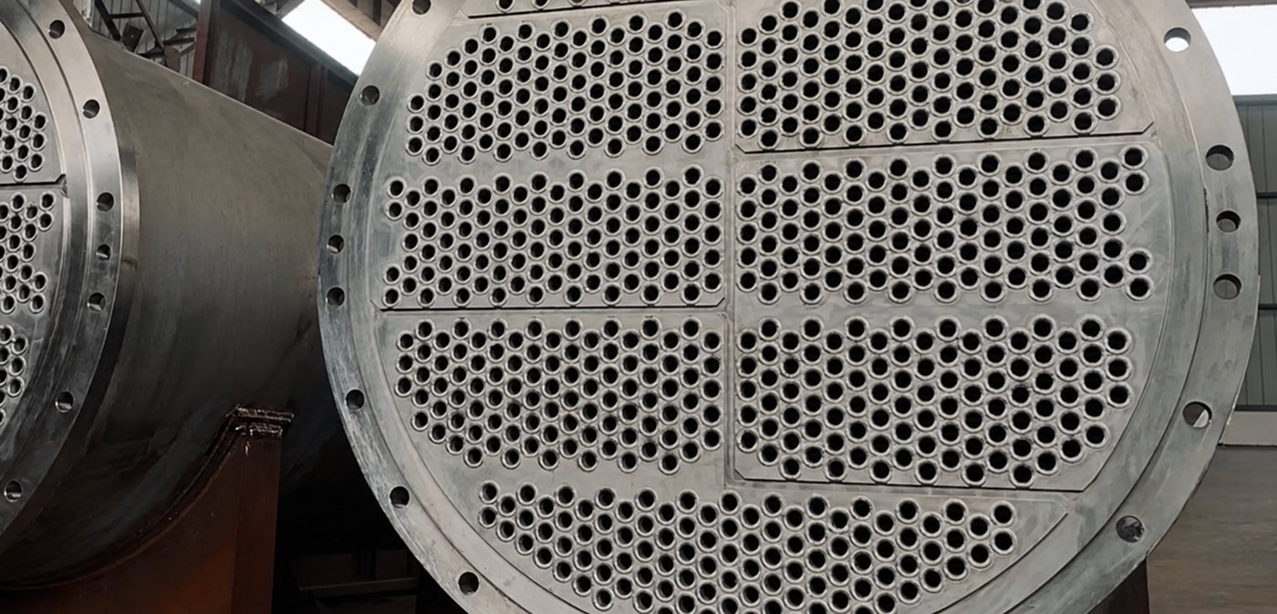 A large shell-and-tube heat exchanger bundle — the core UltraMax duty