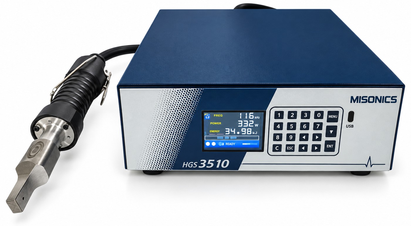 A Misonics hand-held ultrasonic welding gun on its lead, plugged into an HGS 3510 generator