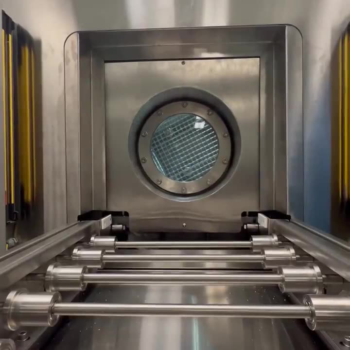 UltraWash 300 chamber door open, basket about to roll in